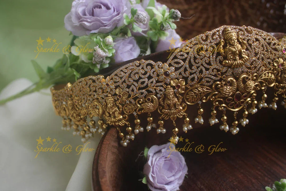 Gold alike AD stone lakshmi dancing peacock carved hipbelt - Sparkle and Glow