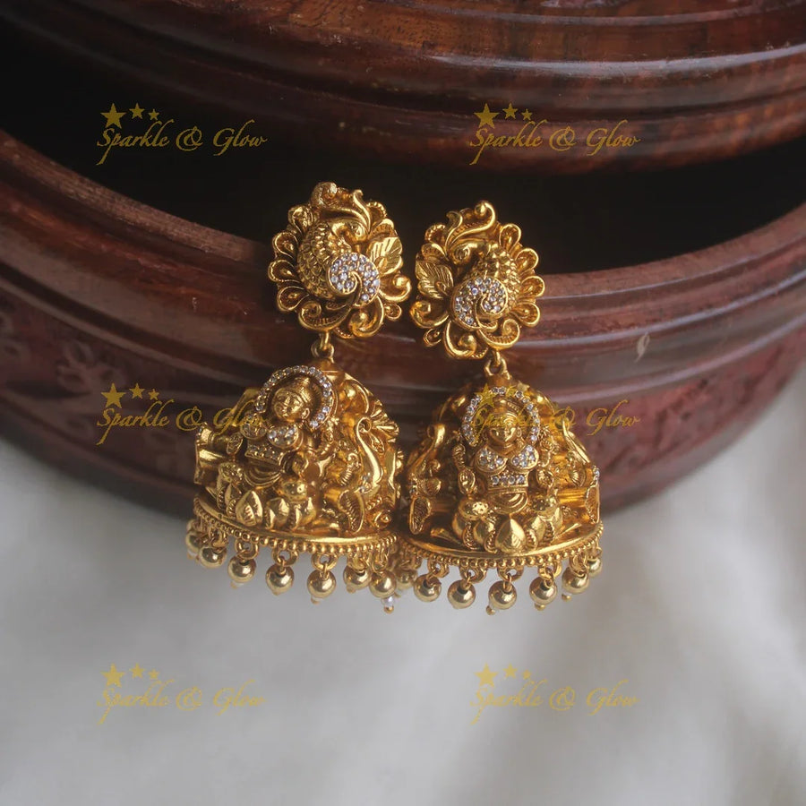 Gold alike peacock studded lakshmi jhumkas - Sparkle and Glow