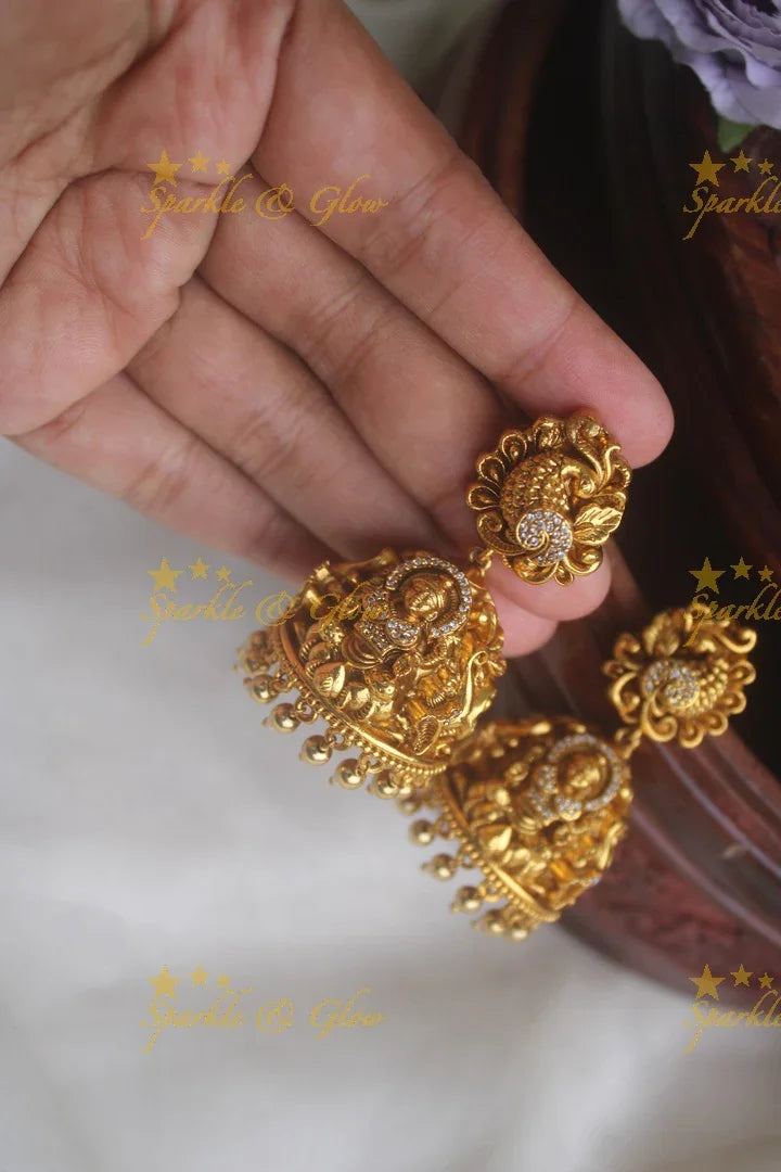 Gold alike peacock studded lakshmi jhumkas - Sparkle and Glow