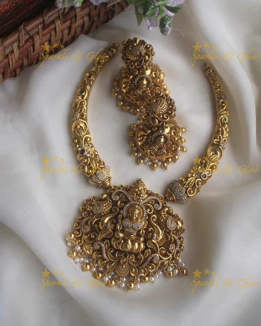 Intricate gold alike pipe necklace with elephant lakshmi carved pendent - Sparkle and Glow