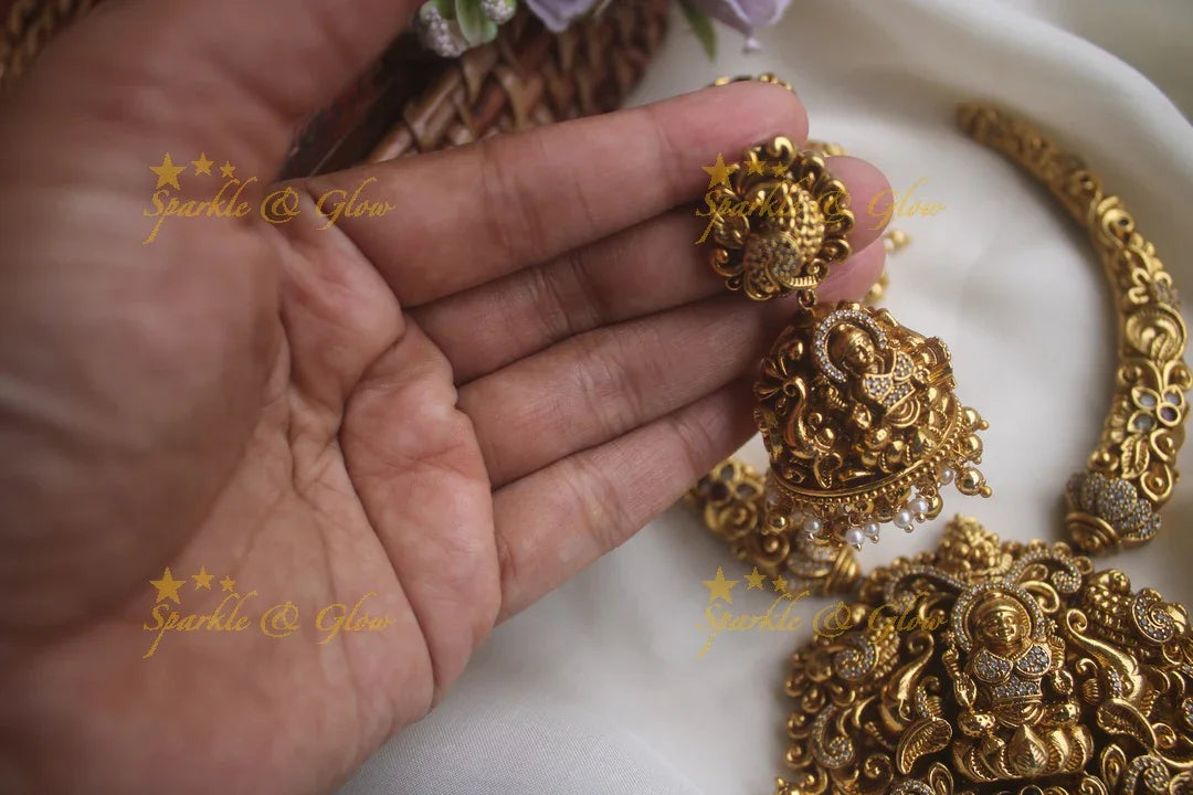Intricate gold alike pipe necklace with elephant lakshmi carved pendent - Sparkle and Glow