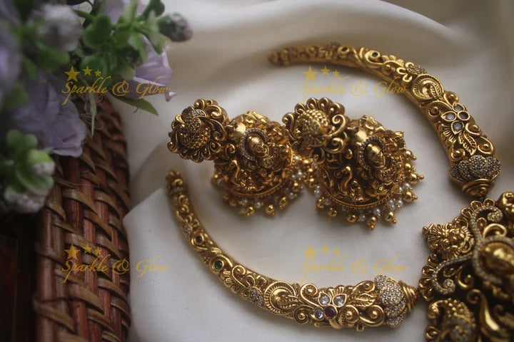 Intricate gold alike pipe necklace with elephant lakshmi carved pendent - Sparkle and Glow