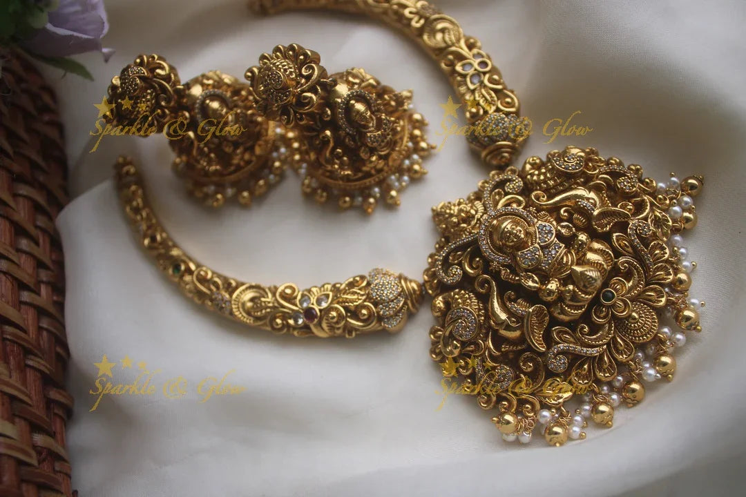 Intricate gold alike pipe necklace with elephant lakshmi carved pendent - Sparkle and Glow