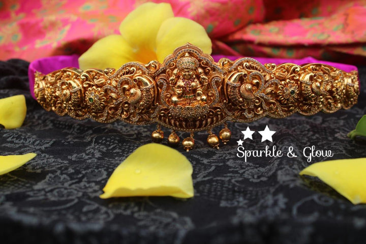 Gold alike polished carved intricately with Lakshmi , peacock design hipbelt - Sparkle and Glow
