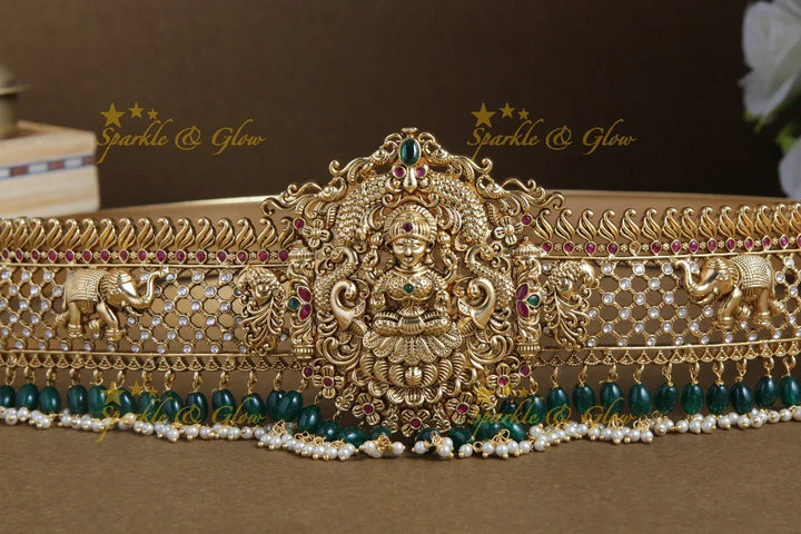 Glittering gold alike lakshmi and elephant carved hipbelt with green beads - Sparkle and Glow