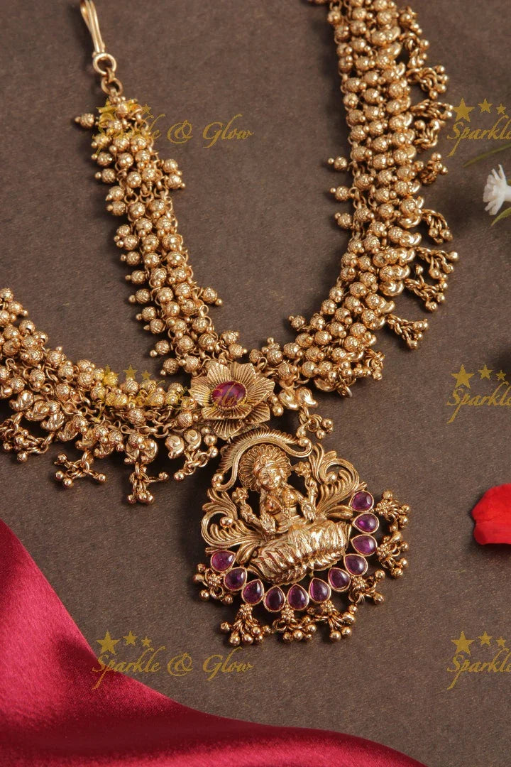 Elegant gold cluster beads bridal three sided maang tikka with lakshmi carved pendent - Sparkle and Glow