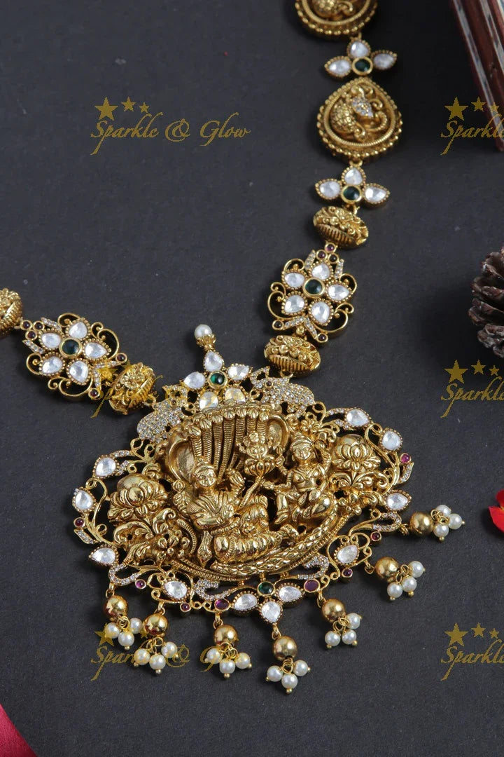 Elegant Seshashayana carved pendent peacock haram with kundan stones - Sparkle and Glow