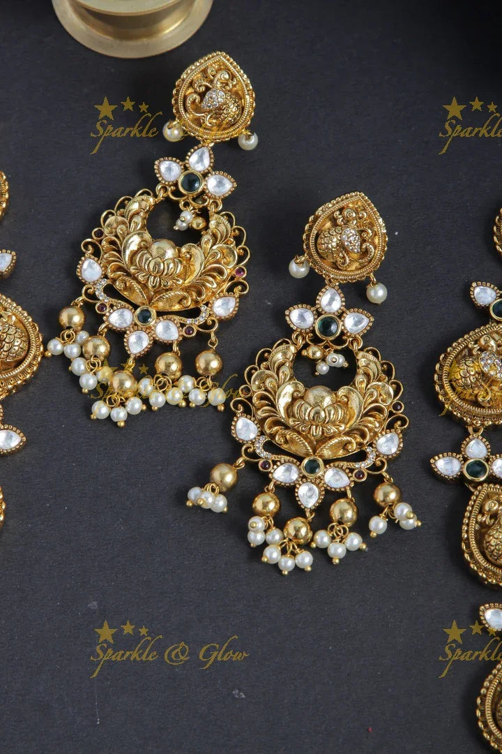 Elegant Seshashayana carved pendent peacock haram with kundan stones - Sparkle and Glow