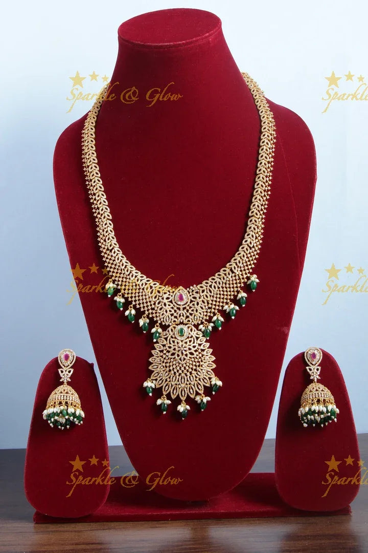 Glorious AD bridal long necklace with green beads - Sparkle and Glow