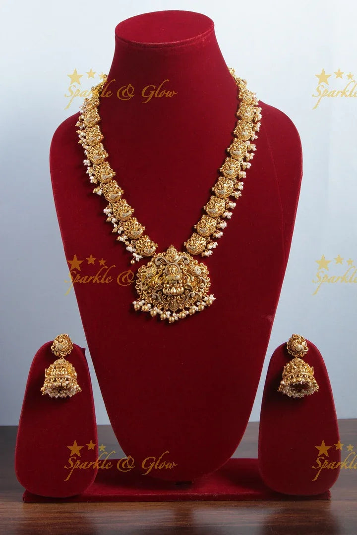 Gold alike dancing peacock lakshmi pendent long necklace - Sparkle and Glow