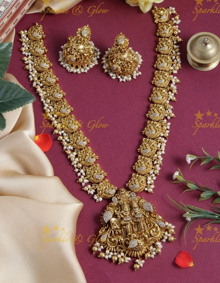 Gold alike long dancing peacock pearl necklace with Radha Krishna pendent - Sparkle and Glow