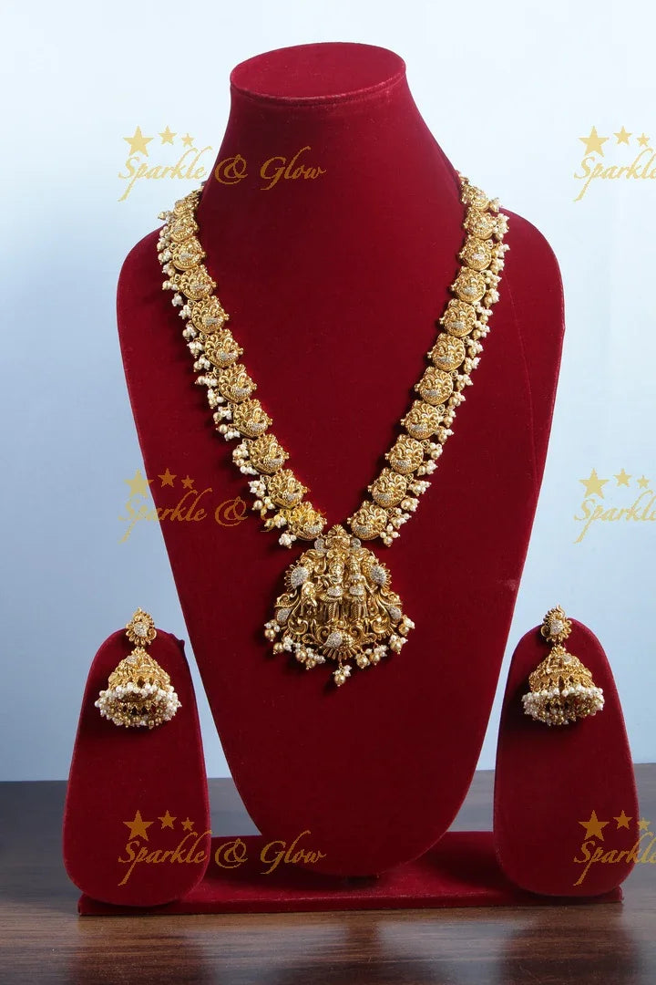 Gold alike long dancing peacock pearl necklace with Radha Krishna pendent - Sparkle and Glow