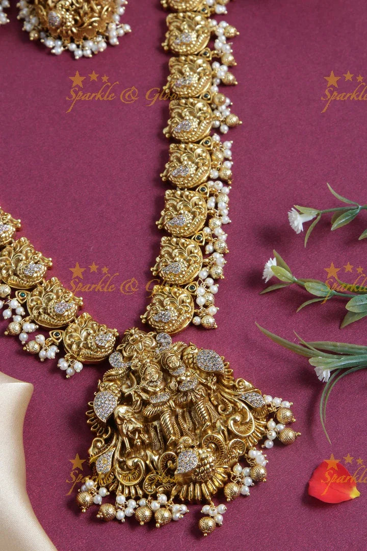 Gold alike long dancing peacock pearl necklace with Radha Krishna pendent - Sparkle and Glow