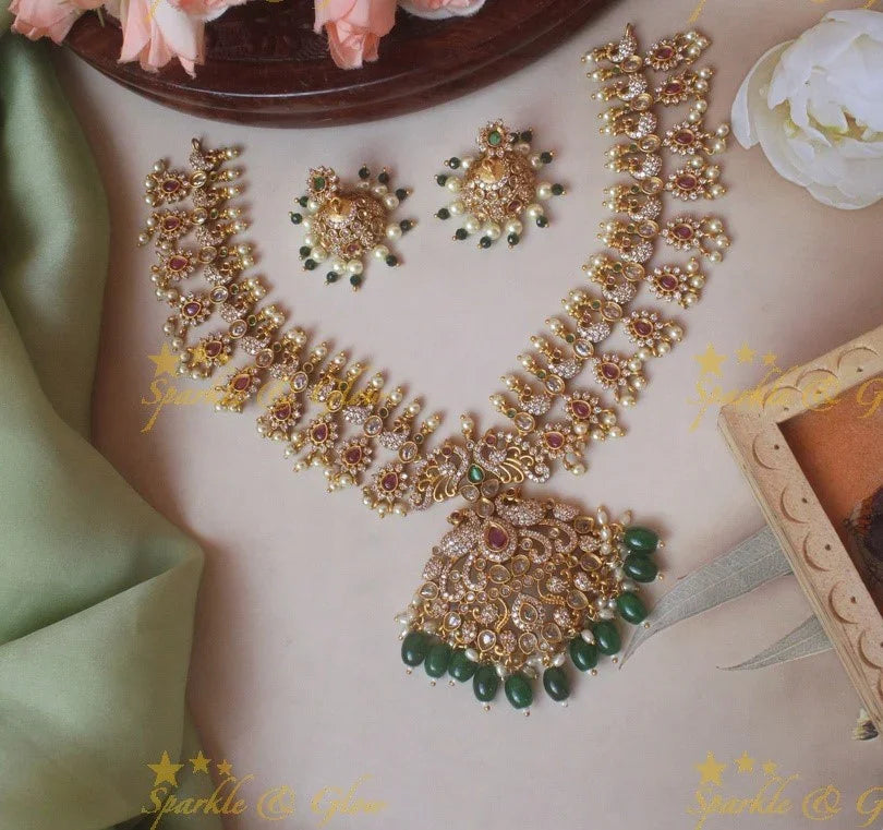 Beautiful floral peacock ad necklace with green beads - Sparkle and Glow