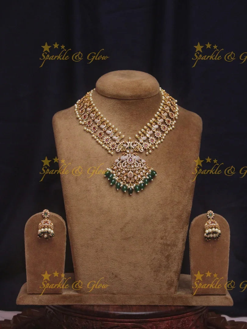 Beautiful floral peacock ad necklace with green beads - Sparkle and Glow
