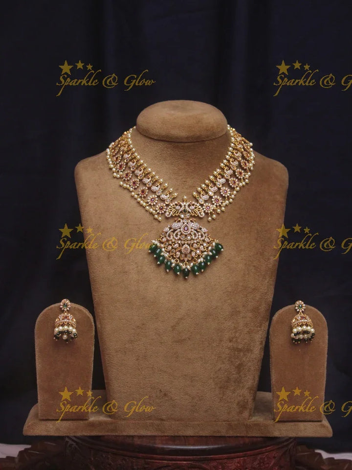 Beautiful floral peacock ad necklace with green beads - Sparkle and Glow