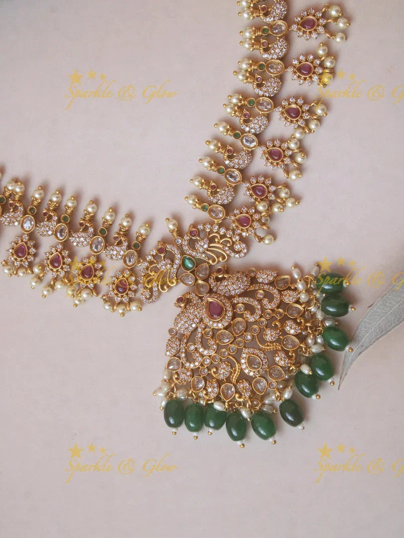 Beautiful floral peacock ad necklace with green beads - Sparkle and Glow