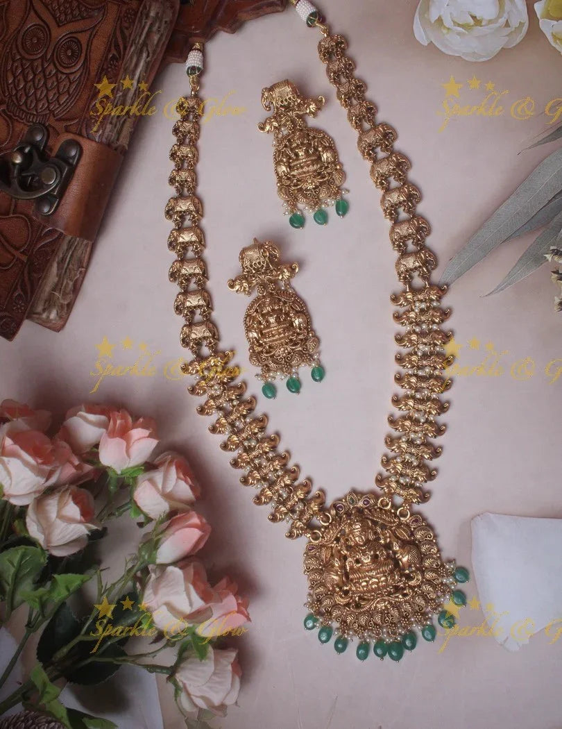 Gold alike Lakshmi Elegant haram with green beads - Sparkle and Glow