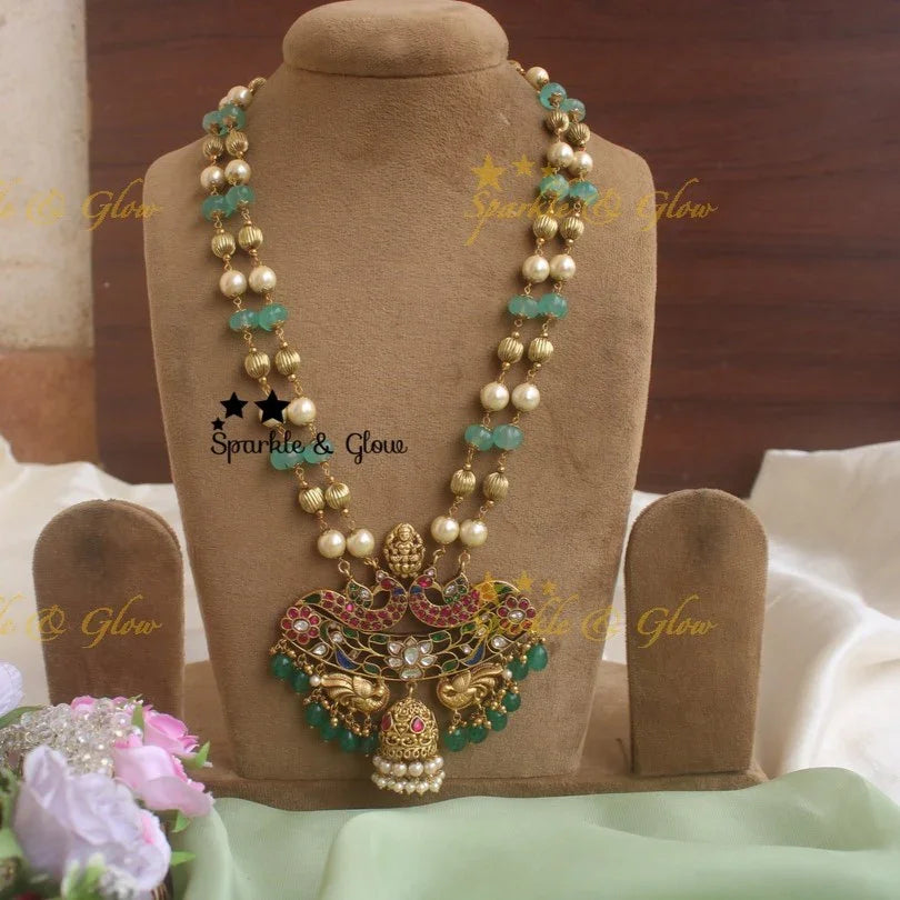 Beautiful pumpkin beads Jadau Lakshmi pendent chain with Lotus and peacock design - Sparkle and Glow