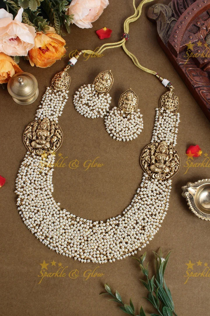Gold alike pearl cluster statement lakshmi carved necklace - Sparkle and Glow