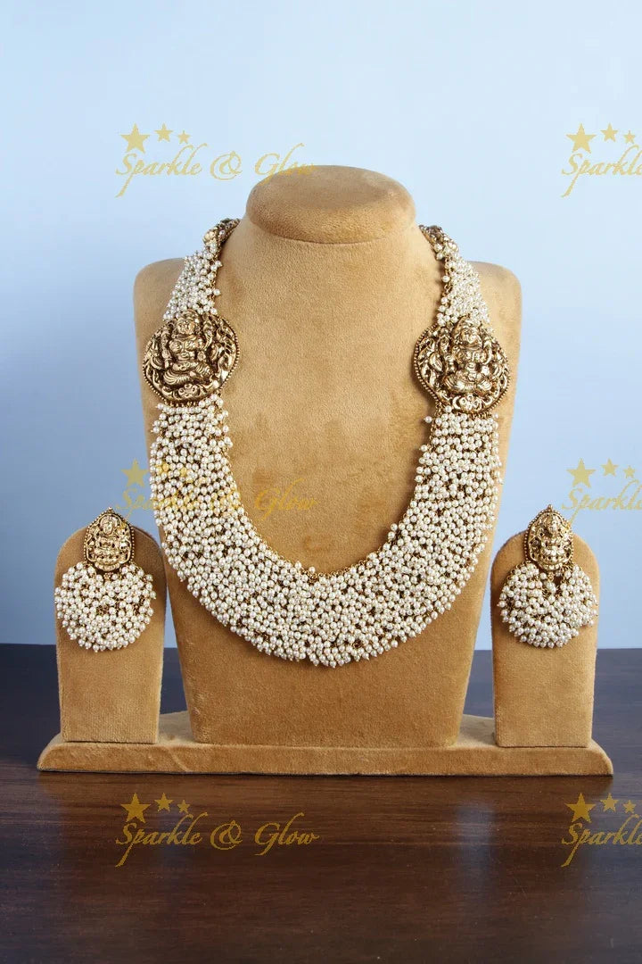 Gold alike pearl cluster statement lakshmi carved necklace - Sparkle and Glow