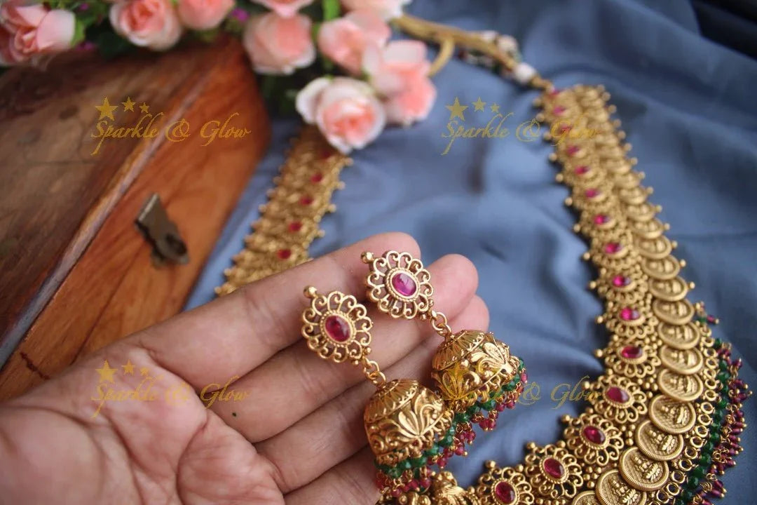 Gold alike polished statement lakshmi coin haram with pearl drops - Sparkle and Glow