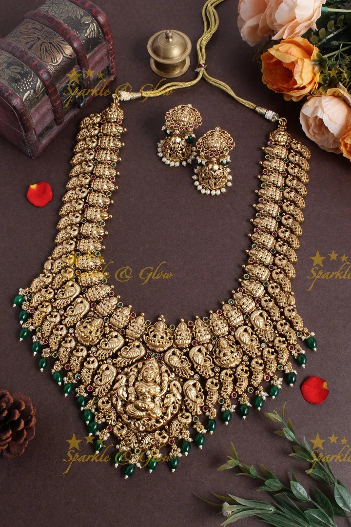 Exclusive bridal lakshmi carved necklace with green beads - Sparkle and Glow
