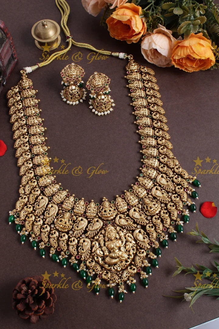 Exclusive bridal lakshmi carved necklace with green beads - Sparkle and Glow