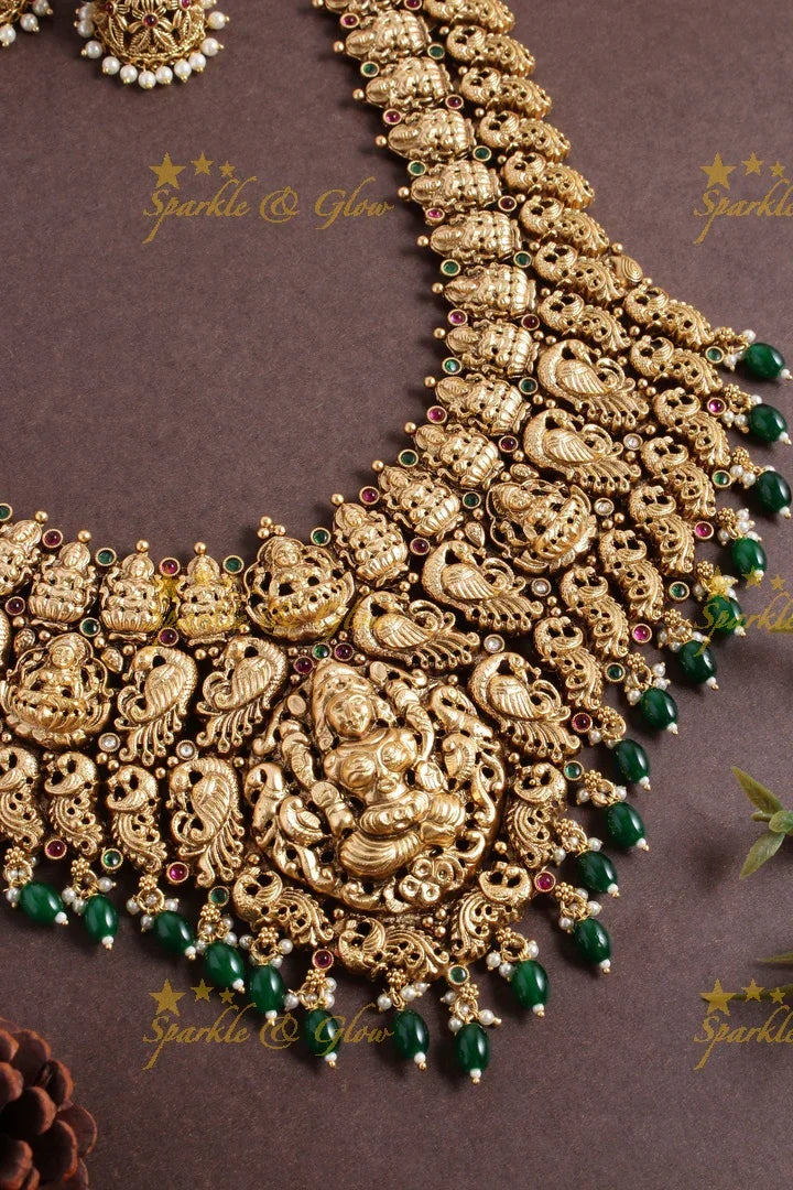 Exclusive bridal lakshmi carved necklace with green beads - Sparkle and Glow