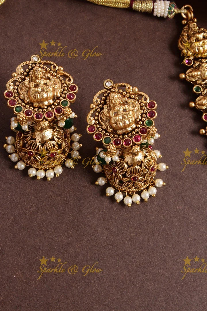 Exclusive bridal lakshmi carved necklace with green beads - Sparkle and Glow