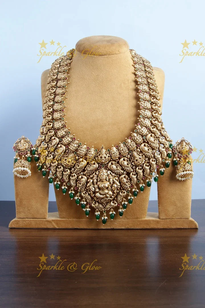 Exclusive bridal lakshmi carved necklace with green beads - Sparkle and Glow