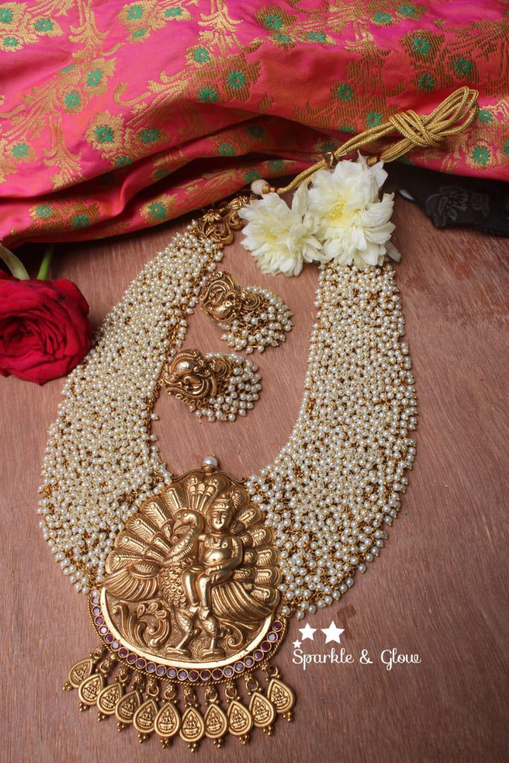 Gold alike polished Lord Kartikeyan statement pearl haram - Sparkle and Glow