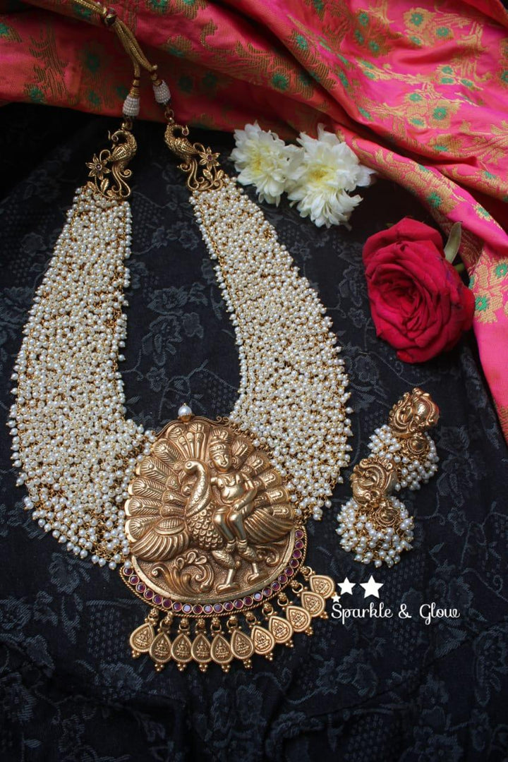 Gold alike polished Lord Kartikeyan statement pearl haram - Sparkle and Glow