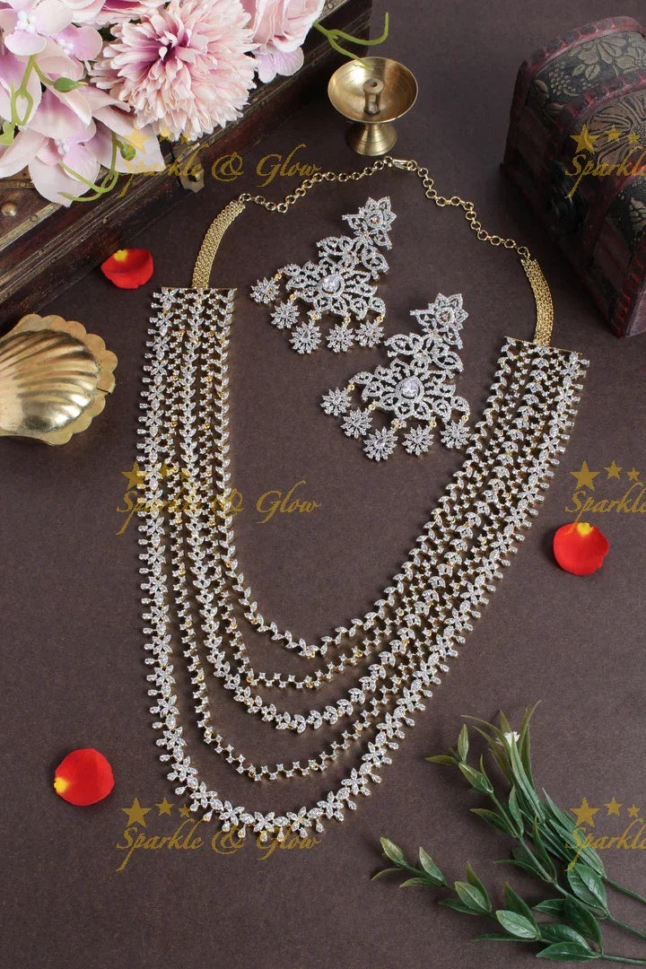 GJ polish multilayered AD leaf design necklace with jhumkas - Sparkle and Glow