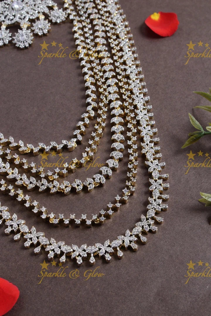 GJ polish multilayered AD leaf design necklace with jhumkas - Sparkle and Glow