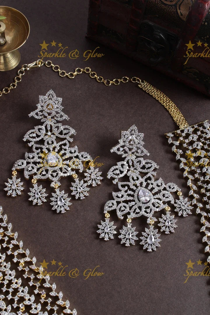 GJ polish multilayered AD leaf design necklace with jhumkas - Sparkle and Glow