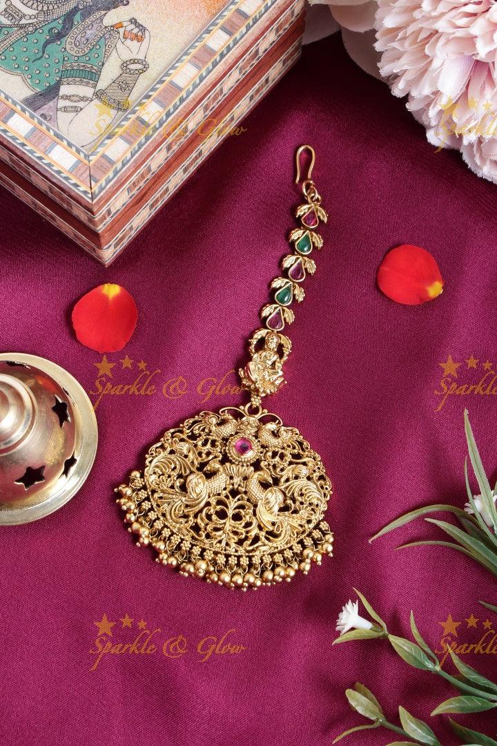 Gold alike leaf design Lakshmi carved peacock gold beads tikka - Sparkle and Glow