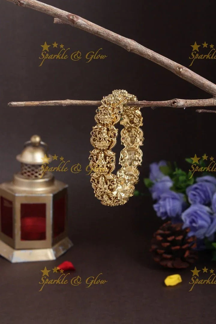Gold alike Lakshmi carved leaf design bangle - Sparkle and Glow
