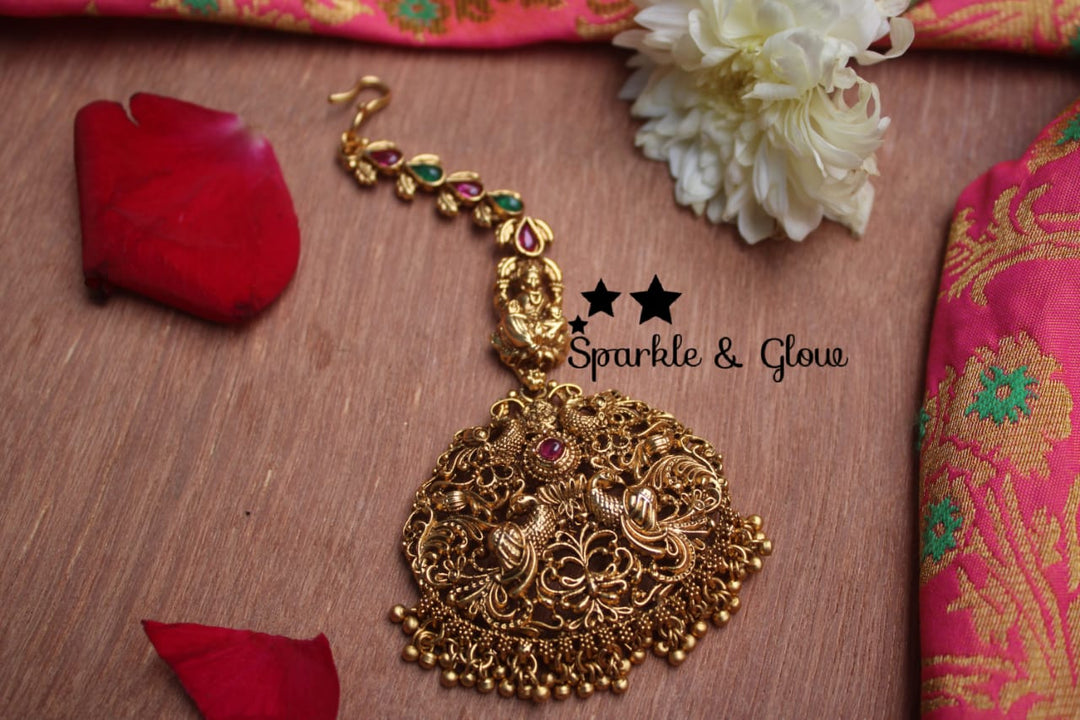 Gold alike polished chandbali style peacock maangthik