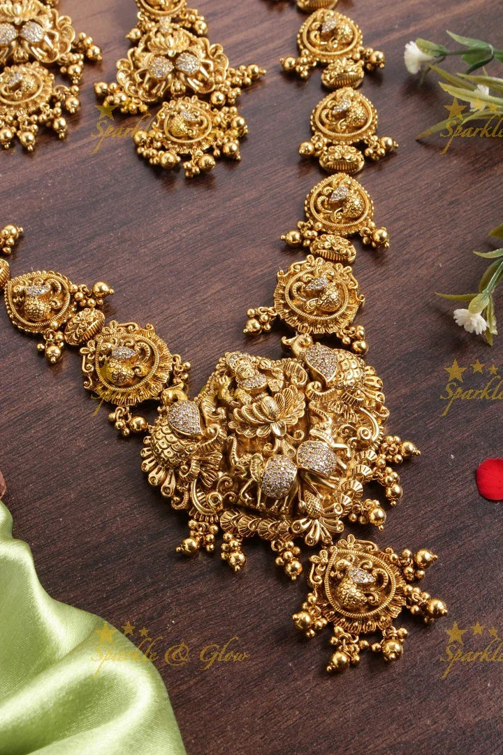 Elegant Gold alike Lakshmi peacock carved haram - Sparkle and Glow