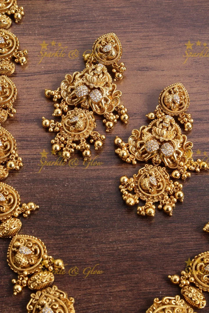 Elegant Gold alike Lakshmi peacock carved haram - Sparkle and Glow