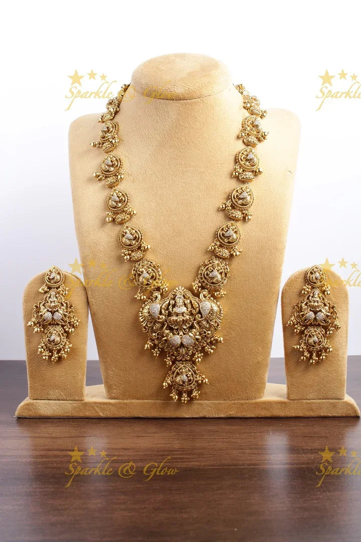 Elegant Gold alike Lakshmi peacock carved haram - Sparkle and Glow