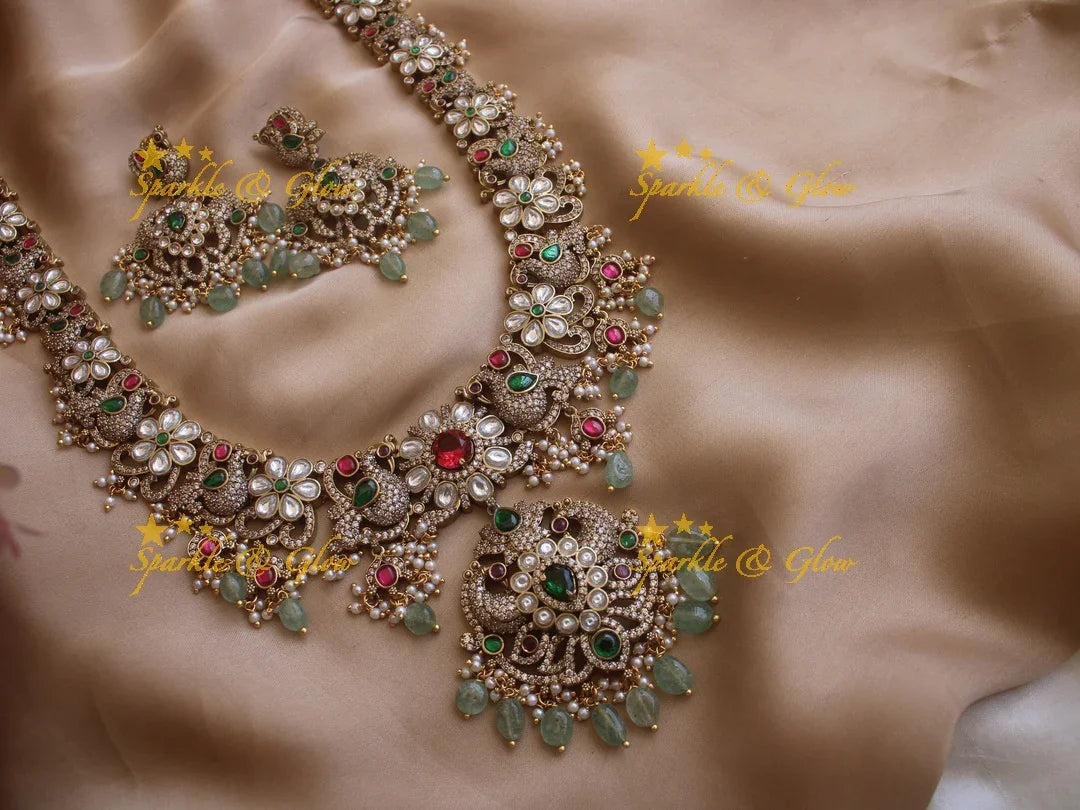Stunning Victorian AD Peacock and floral haram with mint Green Beads - Sparkle and Glow