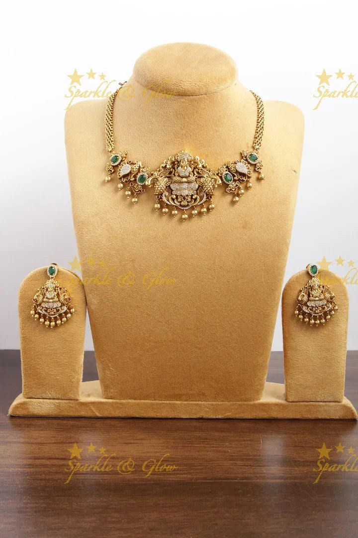 Beautiful gold alike ad stones Lakshmi choker with gold beads - Sparkle and Glow