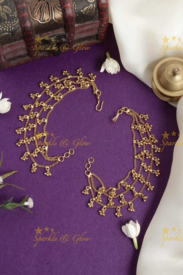 Elegant 3 layered gold beads earchain - Sparkle and Glow