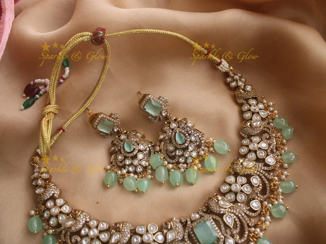 Gorgeous Peacock Victorian AD necklace with pastel green beads - Sparkle and Glow
