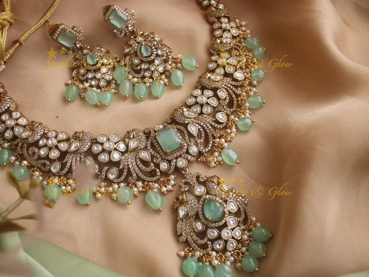 Gorgeous Peacock Victorian AD necklace with pastel green beads - Sparkle and Glow