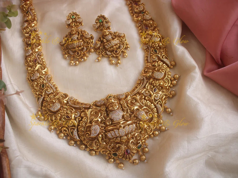 Grand Intricate gold alike Bridal Lakshmi Haram - Sparkle and Glow