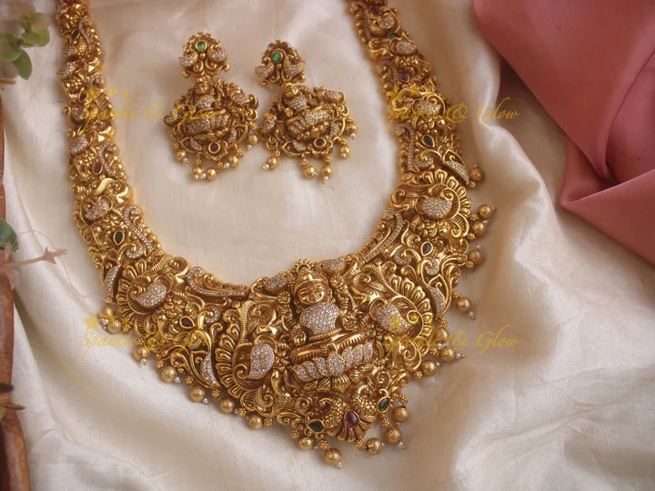 Grand Intricate gold alike Bridal Lakshmi Haram - Sparkle and Glow