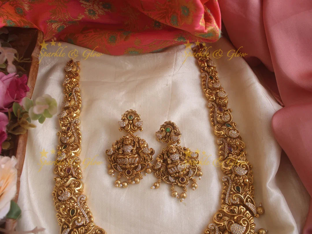 Grand Intricate gold alike Bridal Lakshmi Haram - Sparkle and Glow